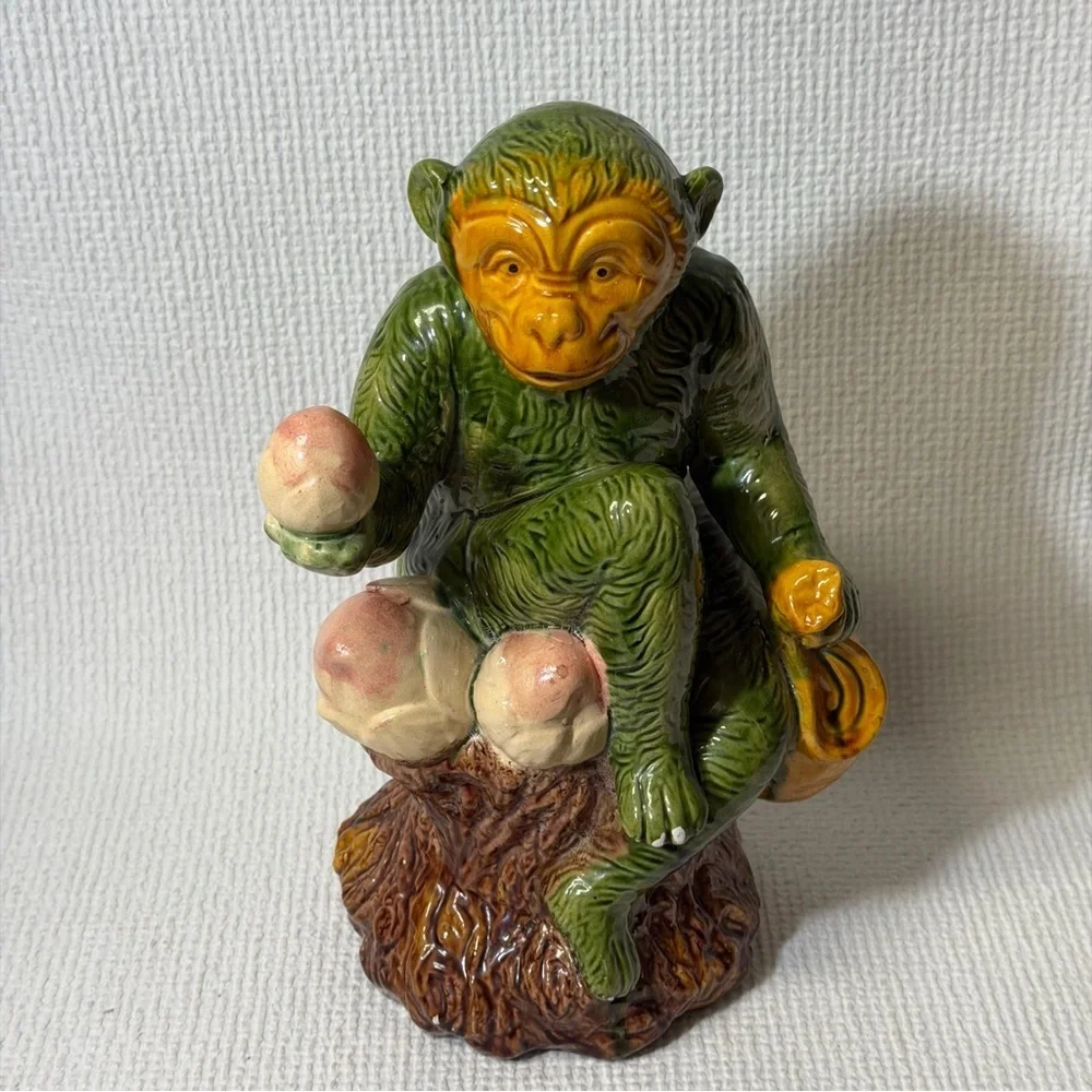 Antique Collectible Monkey Holds Fruits and Water bag.